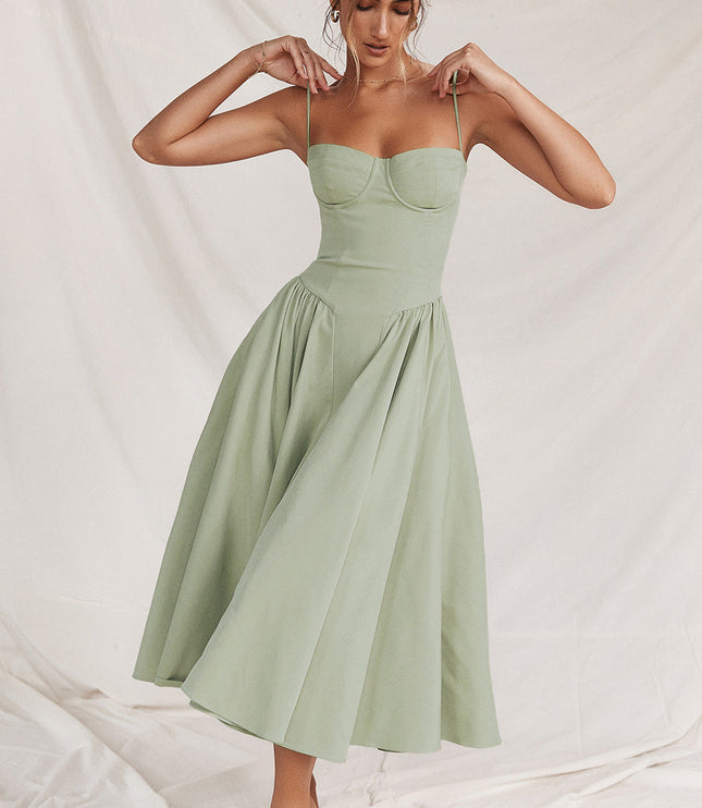 Light green cocktail midi dress with adjustable straps, corset bodice, and full skirt