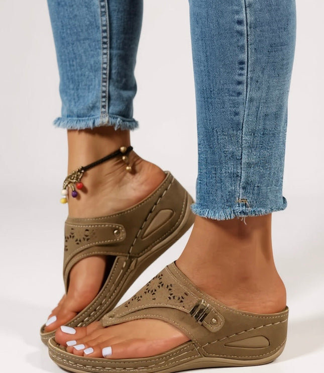 Khaki tan thong sandal with cushioned footbed and adjustable buckle strap