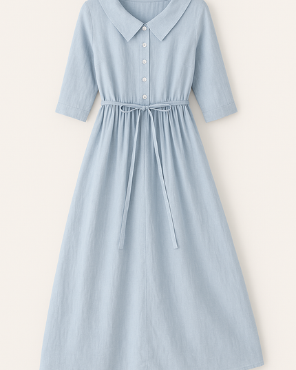 Front view of light blue midi dress with button front and tie waist detail