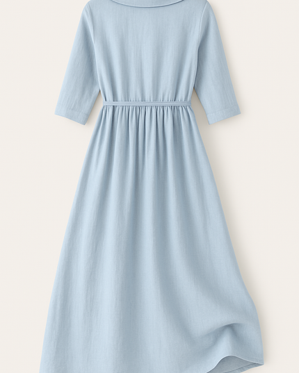 Back view of light blue cotton midi dress with gathered waist and three-quarter sleeves