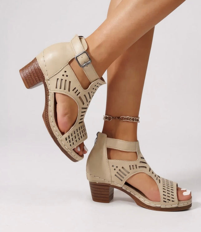 Beige cutout block heel sandals with ankle strap and linear perforated pattern
