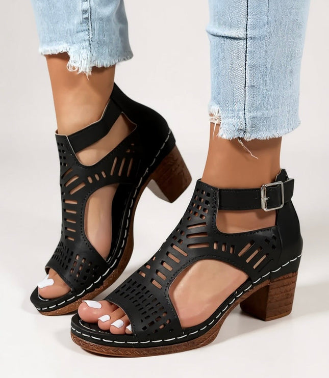 Black cutout block heel sandals with ankle strap and perforated details