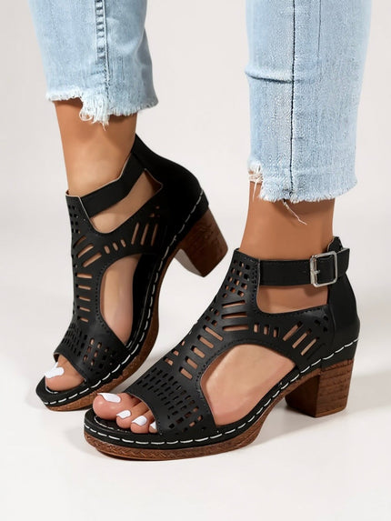 Black cutout block heel sandals with ankle strap and perforated details