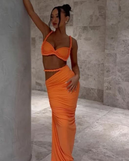 Bright orange two-piece maxi set with sweetheart crop top and rope detail