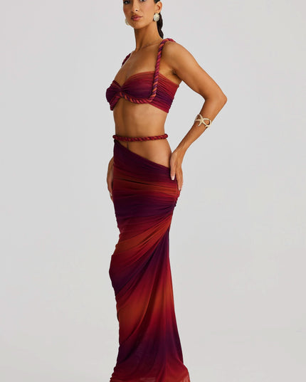 Side view of red ombre maxi set showing ruched skirt