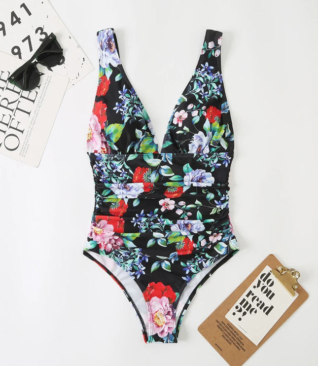 Black floral v-neck one piece bathing suit with ruched waist and colorful flowers