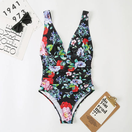Black floral v-neck one piece bathing suit with ruched waist and colorful flowers