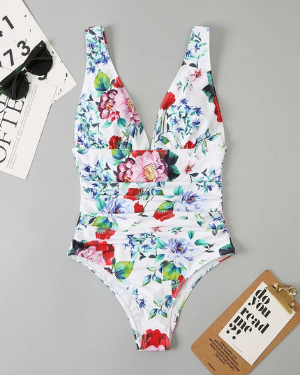 White floral v-neck one piece swimsuit with red and blue flower pattern