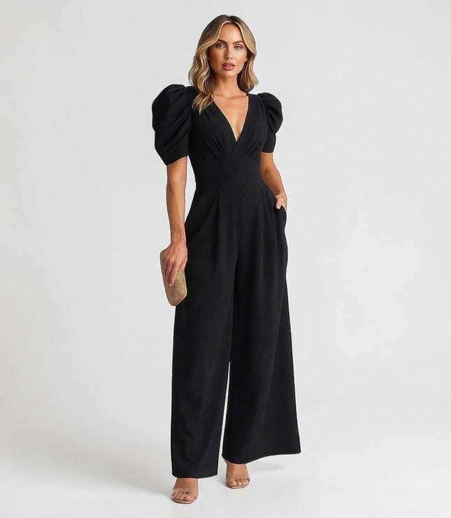 Black wide leg jumpsuit with puff sleeves, deep V-neck, and tailored waist