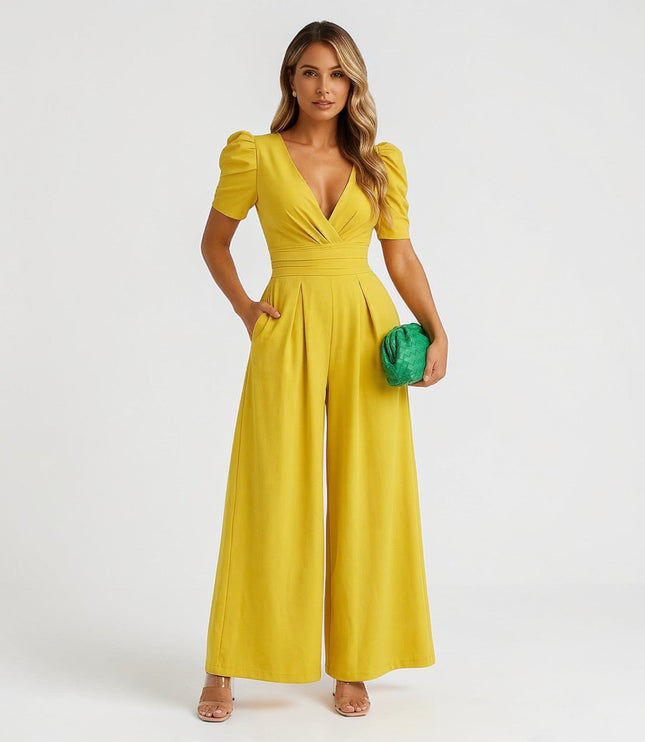 Yellow wide leg jumpsuit with puff sleeves, deep V-neck, and pleated waist