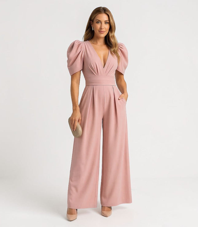 Pink wide leg jumpsuit with puff sleeves, deep V-neck, and cinched waist