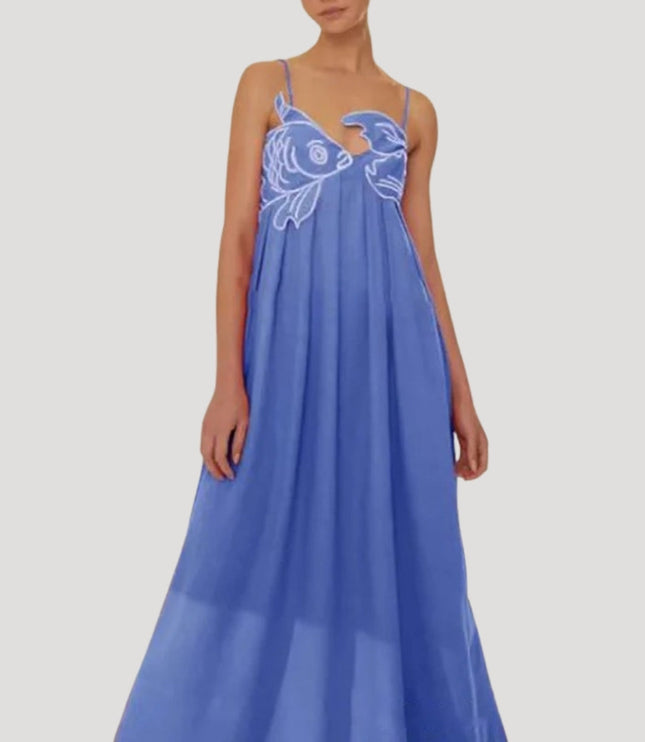 Periwinkle blue women's cami maxi sundress with white embroidered fish and crab detail on the bodice, a flowing dress.