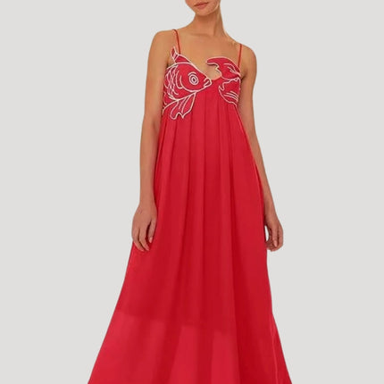 Red women's cami maxi sundress with white embroidered fish and crab detail on the bodice, flowing skirt.