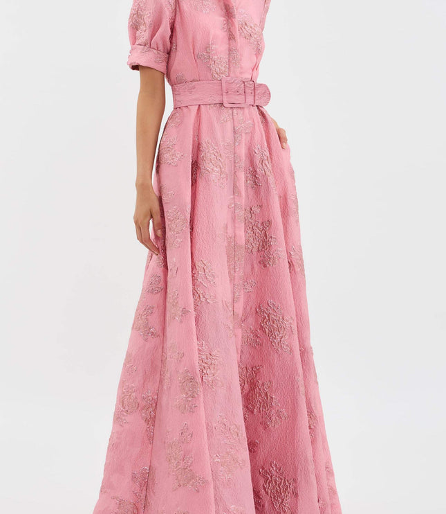Side view of pink floral maxi dress showing belted waist and long A-line skirt