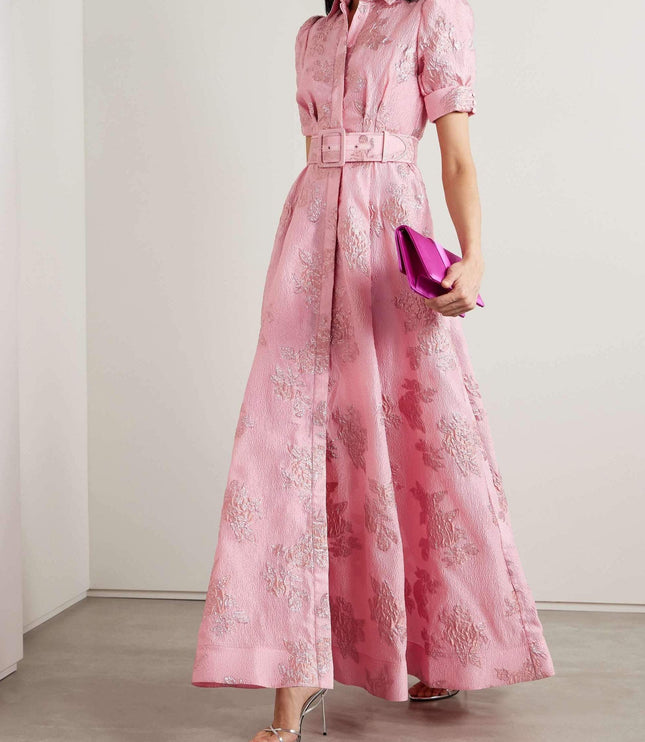Pink floral maxi dress with puff sleeves, collared neckline, and wide belted waist
