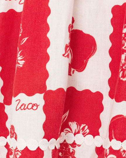 Red and cream floral fabric texture with pearl scalloped trim detail