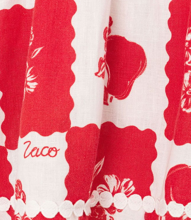 Red and cream floral fabric texture with pearl scalloped trim detail