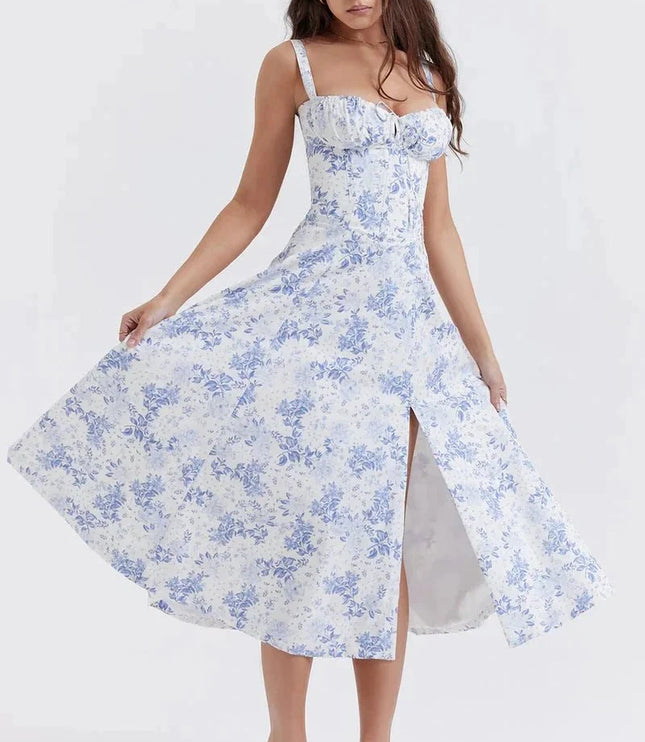 Blue and white floral midi dress with square neckline, wide straps, and side slit