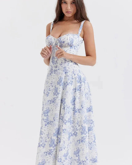 Front view of blue floral midi dress with fitted bodice, wide straps, and flared skirt