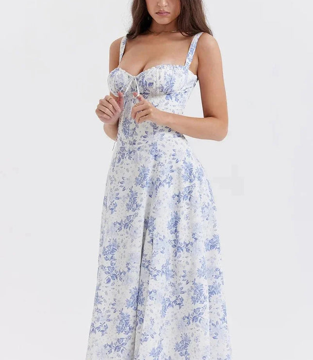 Front view of blue floral midi dress with fitted bodice, wide straps, and flared skirt
