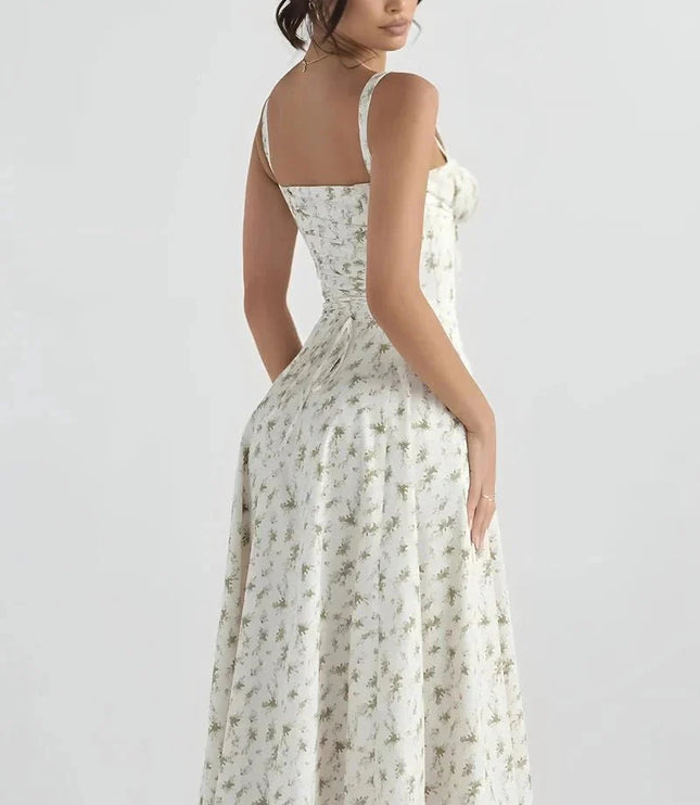 Back view of white floral midi dress with open back and wide shoulder straps