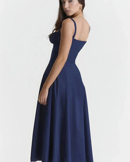 Back view of navy blue midi dress with open back and straps