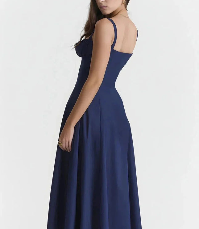 Back view of navy blue midi dress with open back and straps