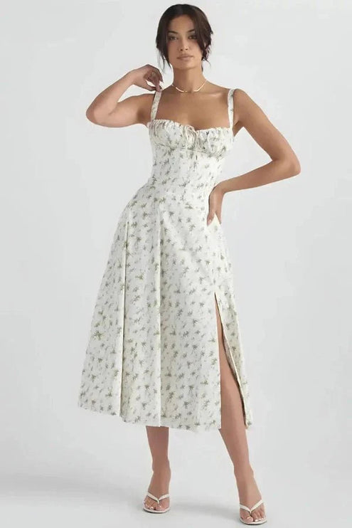 White floral midi dress with square neckline, wide straps, and front slit