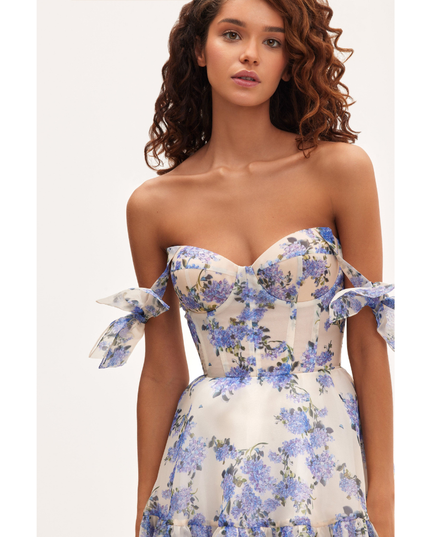 Front close-up of sweetheart neckline on blue floral maxi dress with tie-off sleeves