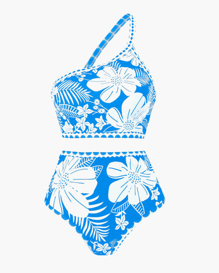 Blue and white floral one shoulder bikini top with scalloped trim and palm leaf print