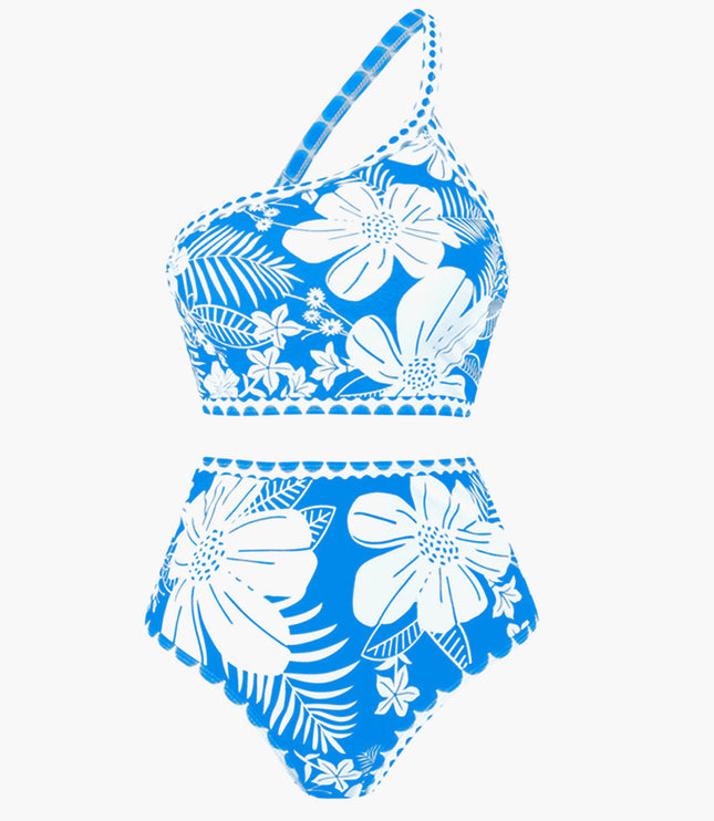 Blue and white floral one shoulder bikini top with scalloped trim and palm leaf print