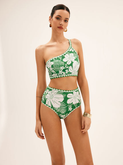 One shoulder green floral bikini top with white flowers and scalloped trim
