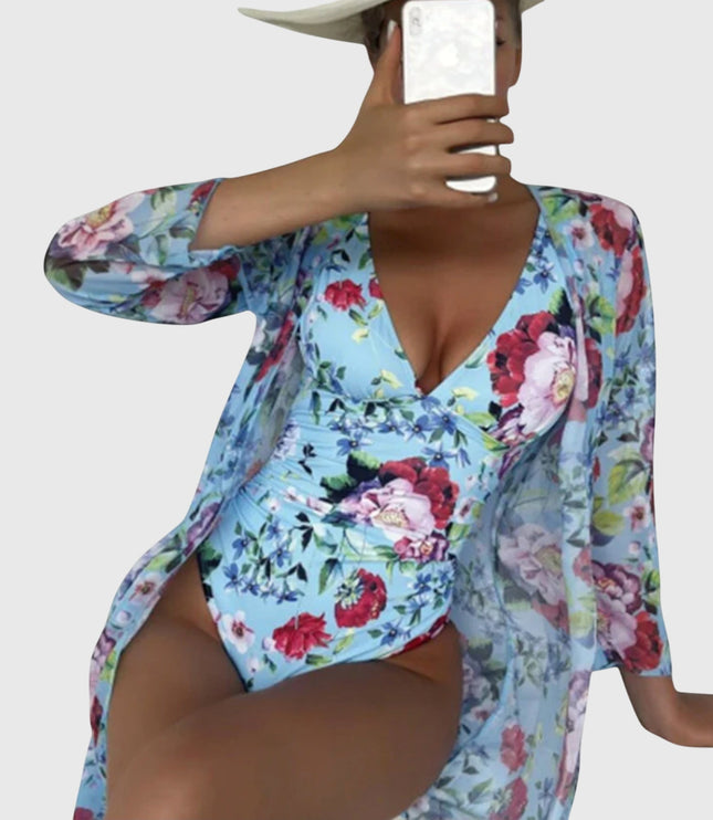 Light blue floral designer swimsuit with long-sleeve wrap showing wrap detail