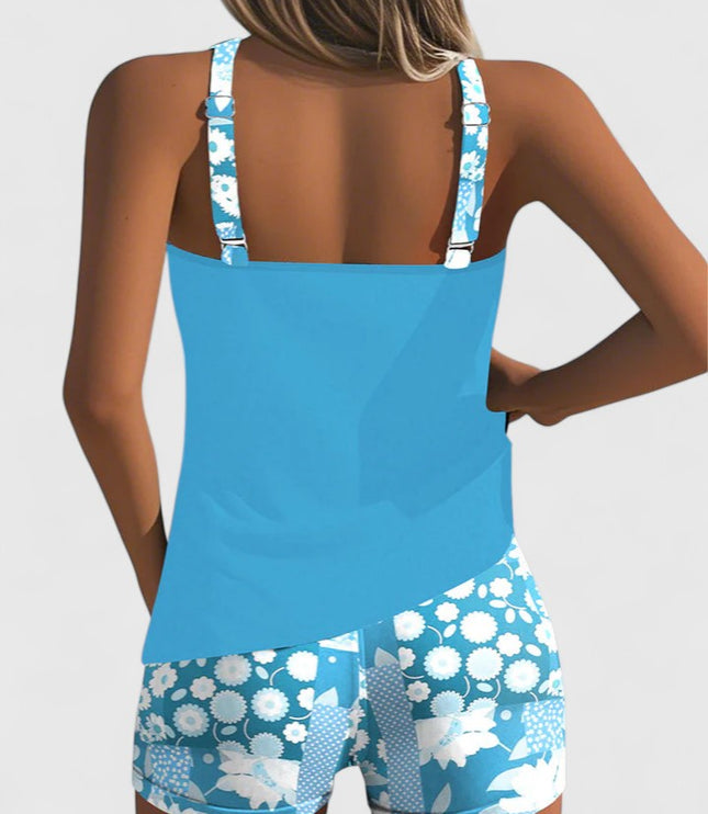 Turquoise tankini with white floral print shorts back view