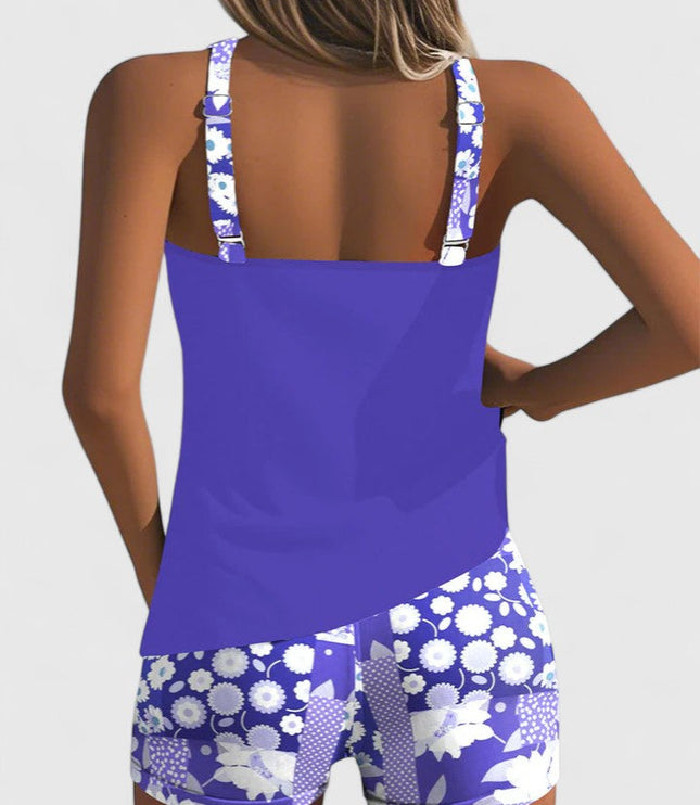 Purple tankini with white daisy print shorts back view