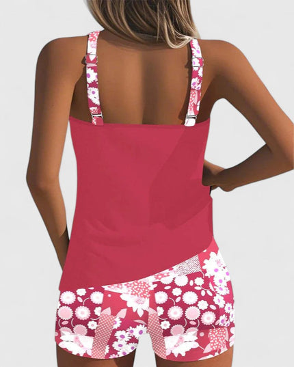 Back view of pink tankini with white daisy print shorts