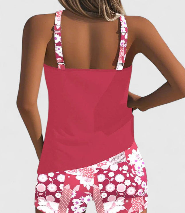 Back view of pink tankini with white daisy print shorts