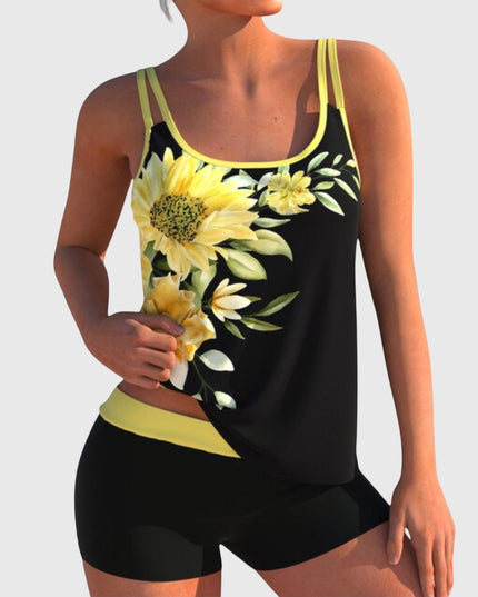 Black tankini swimsuit with yellow sunflower and daisy print and yellow trim with matching shorts
