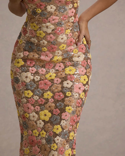 Close-up of women’s floral sequin maxi dress showing multicolor flower sequins and fitted bodice