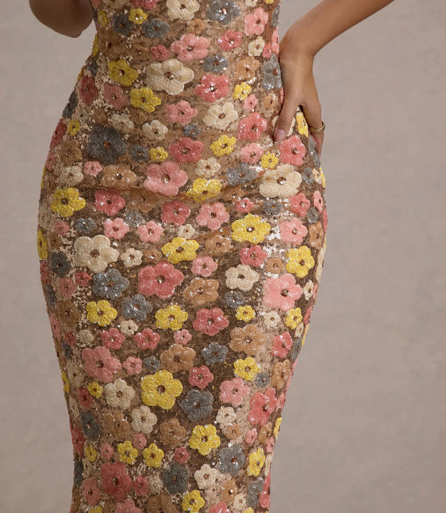 Close-up of women’s floral sequin maxi dress showing multicolor flower sequins and fitted bodice