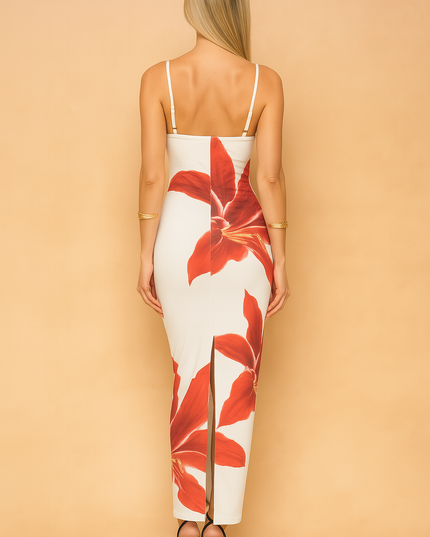 Back view of white floral spaghetti strap maxi dress with red flower print and slit detail