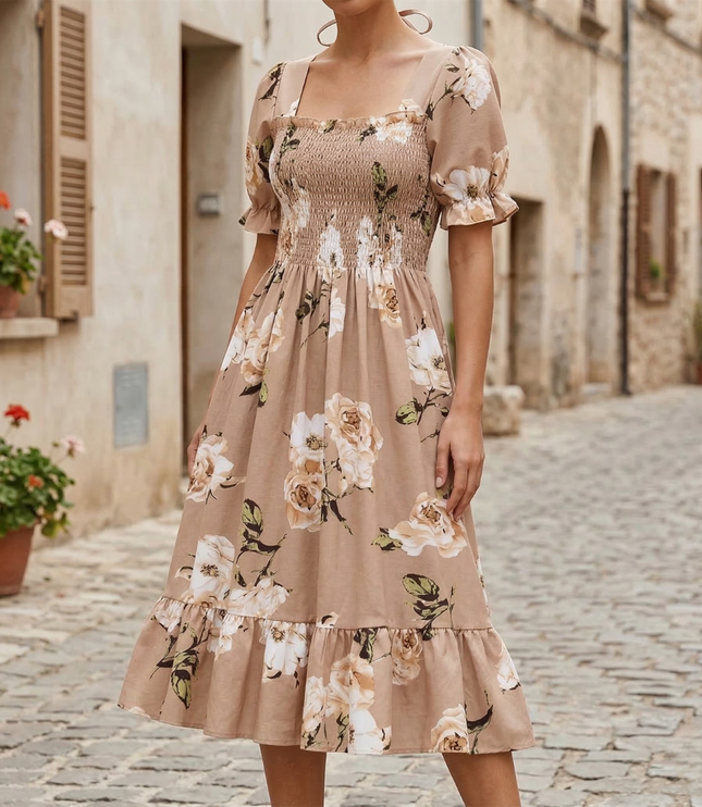 Beige floral midi dress with square neck, puff sleeves, and smocked bodice on a model