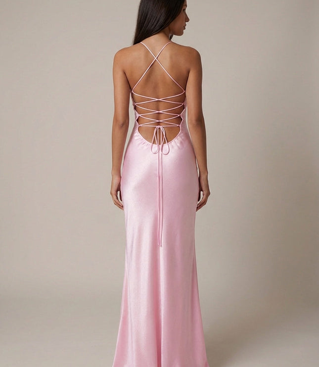 Back view of pink halter maxi dress showing lace-up strappy detail