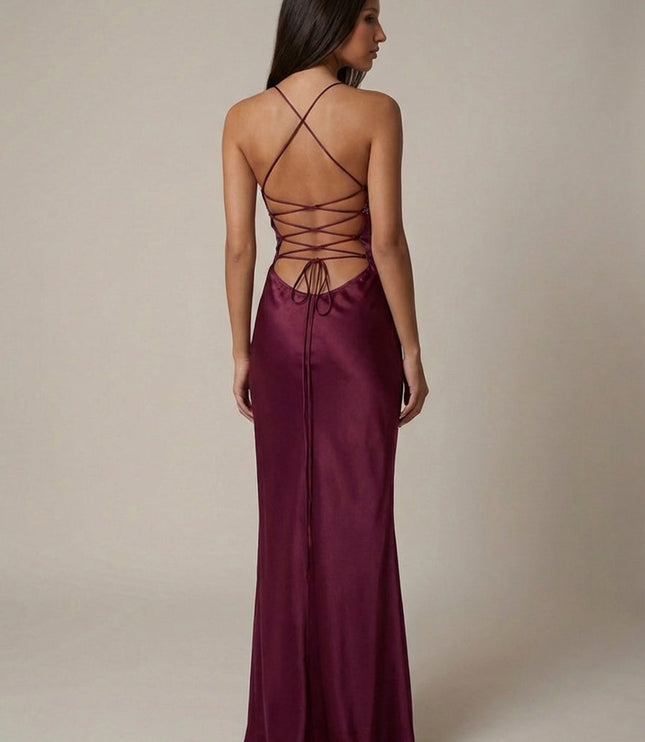 Back view of burgundy halter maxi dress showing lace-up strappy back