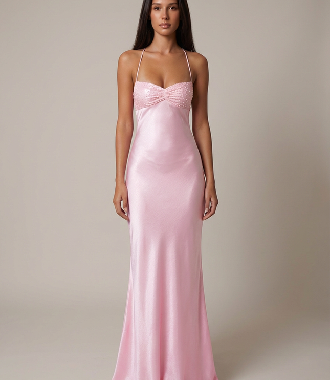Pink beaded halter maxi dress with sweetheart neckline and flowing skirt