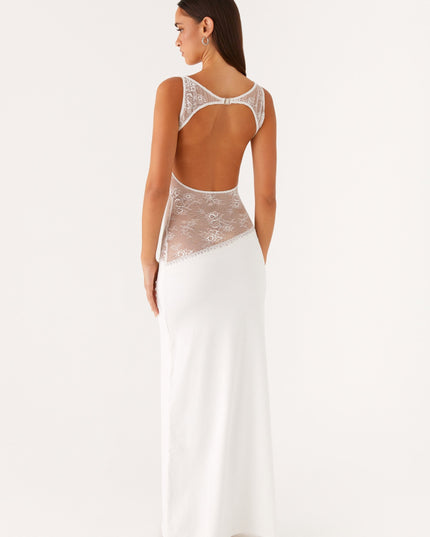 Back view of white maxi dress with open back and lace detail
