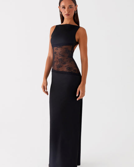 Side view of black formal maxi dress with lace waist cutout