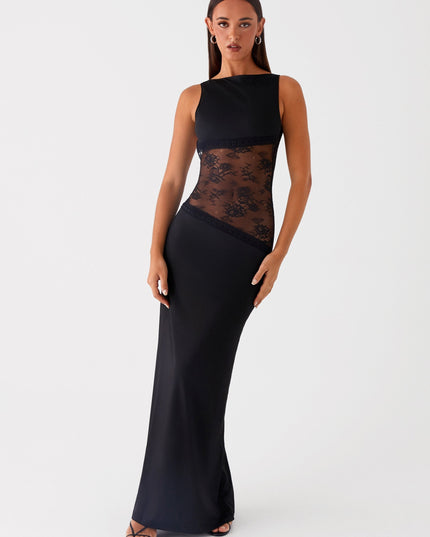Front view of black maxi dress with sheer lace waist and solid skirt