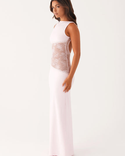 Side view of pale pink maxi dress with open back and lace waist