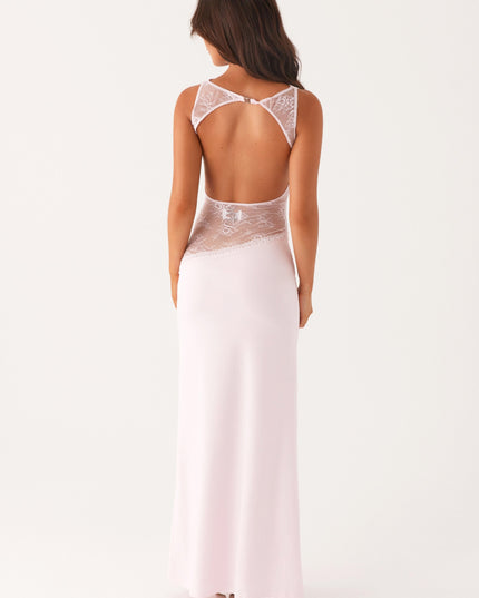 Back view of pale pink formal maxi dress with lace waist cutout